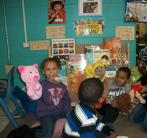 Children playing puppet show. Miracle (left), Quawi (center) and Alexavier (right). Children playing puppet show. Miracle (left), Quawi (center) and Alexavier (right).