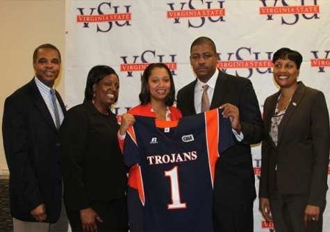 vsucoach President Keith T. Miller (L) is joined by Brandi Scott, new VSU Football Coach Latrell Scott and VSU Athletic Director Peggy Davis