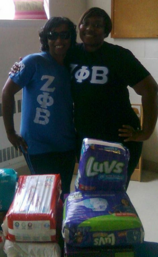 Zeta Phi Beta-Petersburg Chapter providing diapers for babies.