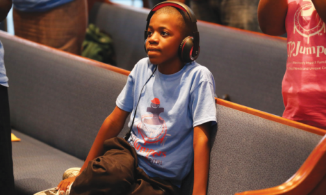 JP wears his headphones to decrease his noise sensitivities. He’s also  wearing his “JP’s Law” shirt for the law named after him that passed  through the VA General Assembly and became effective 7-1-14. JP  was the first person in the state of VA to get a specialized “JP’s Law”  identification card. Find out more about JP’s Law and how it will help  individuals with Autism and Intellectual Disabilities by going to www. JPJumPersFoundation.org
