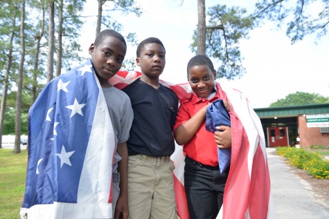 Boys with Flag credit Clevis Harrison