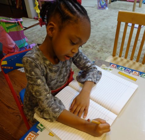 Jillian Writing Name KINDERGARTEN PHOTO